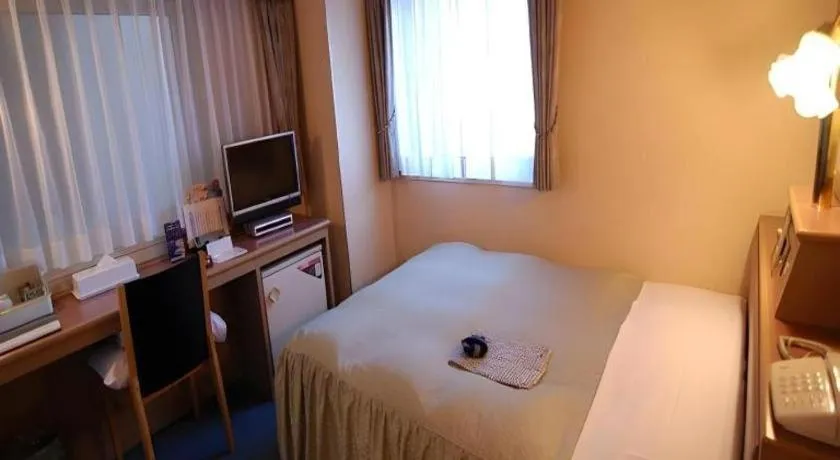 Bed in Hotel Starplaza Ikebukuro