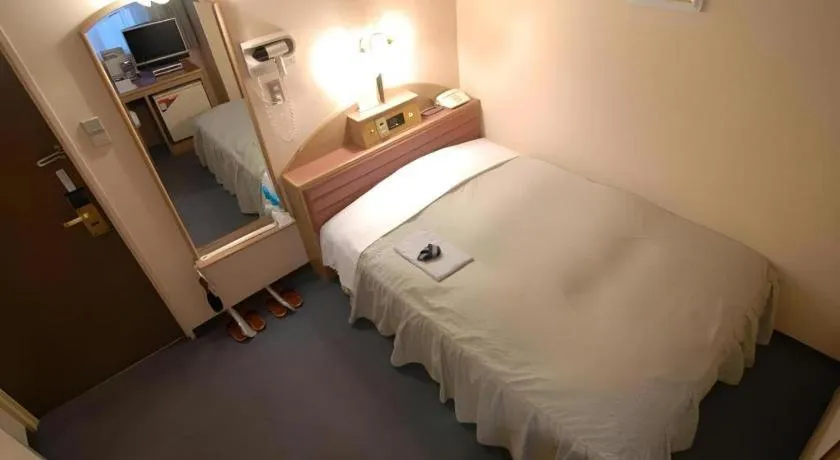 Bed in Hotel Starplaza Ikebukuro