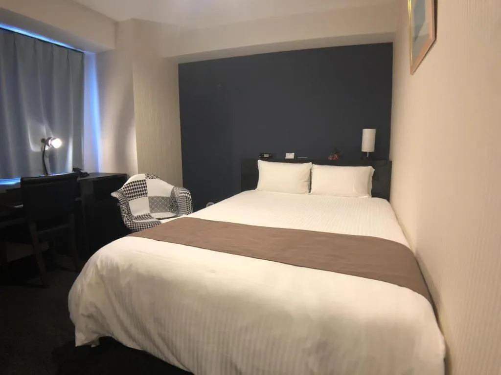 Bed in Hotel Bougainvillea Akebonobashi