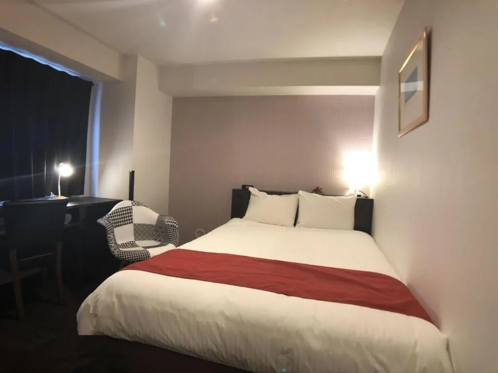 Bed in Hotel Bougainvillea Akebonobashi