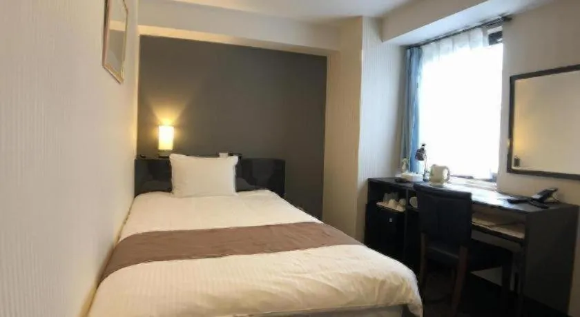 Bed in Hotel Bougainvillea Akebonobashi