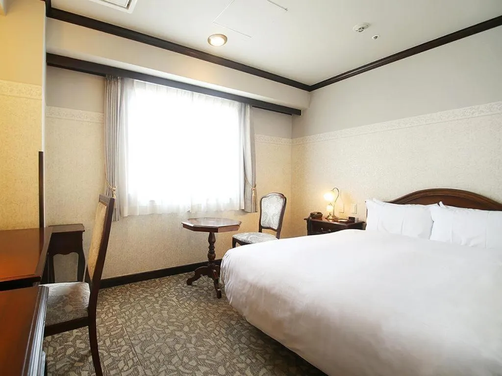 Bed in Hotel Piena Kobe
