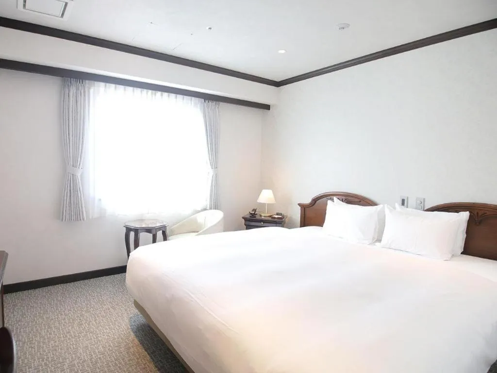 Bed in Hotel Piena Kobe