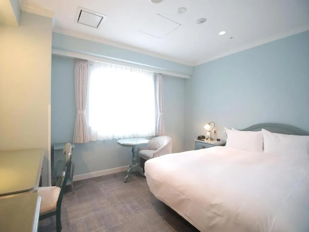 Bed in Hotel Piena Kobe