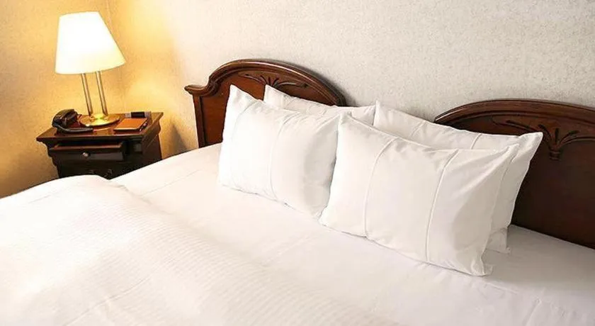 Bed in Hotel Piena Kobe