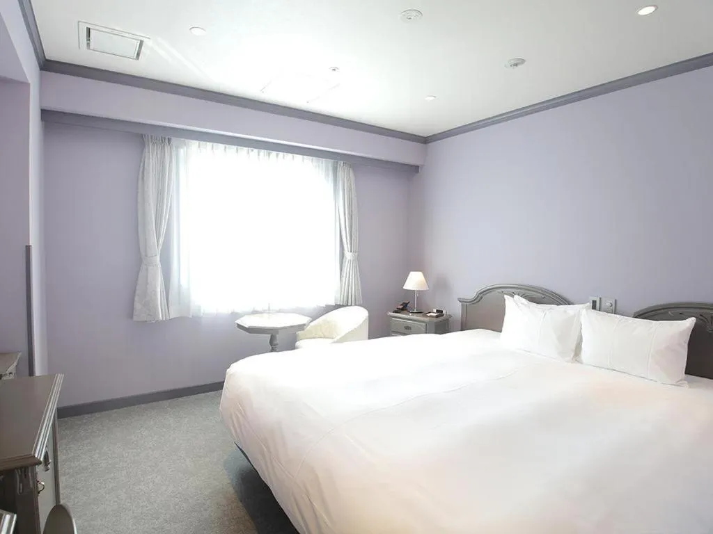 Bed in Hotel Piena Kobe