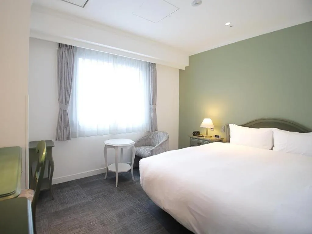 Bed in Hotel Piena Kobe