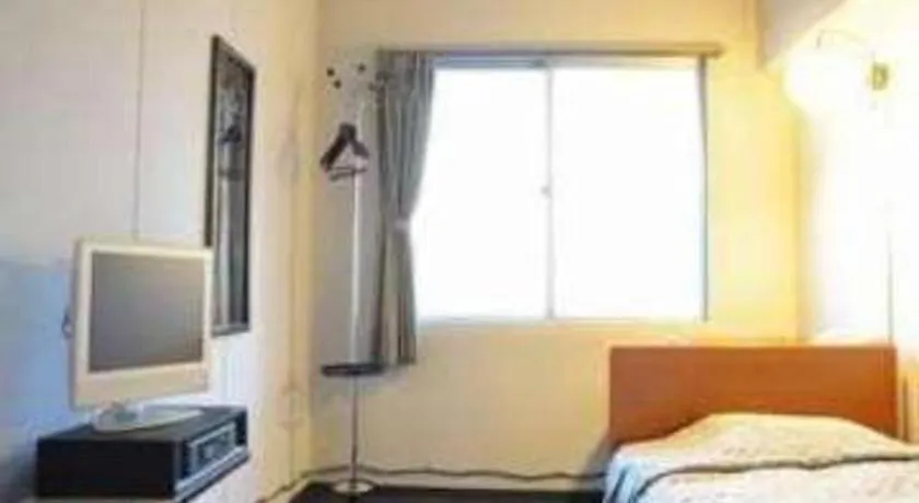 Bed in Tokyo Business Hotel