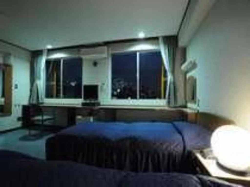 Bed in Tokyo Business Hotel