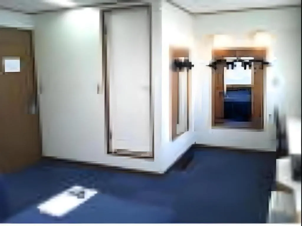 Bed in Tokyo Business Hotel