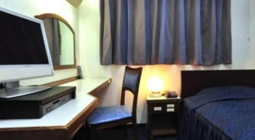 Bed in Tokyo Business Hotel