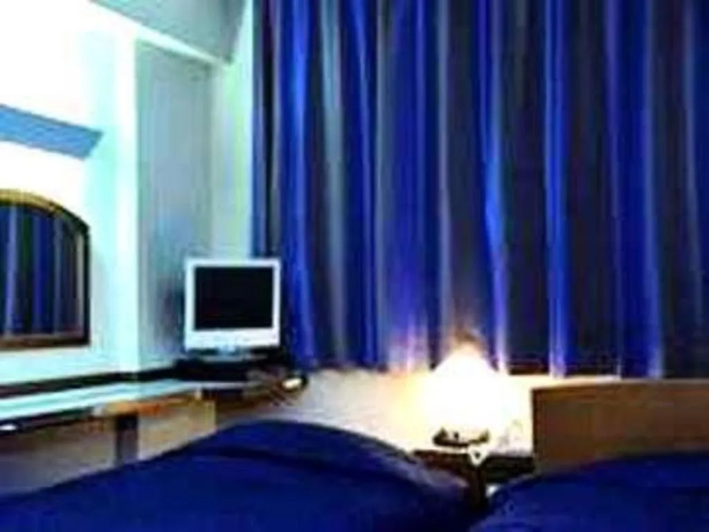 Bed in Tokyo Business Hotel