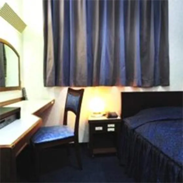 Bed in Tokyo Business Hotel