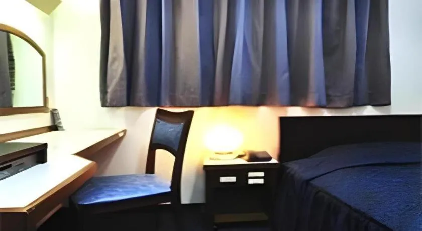 Bed in Tokyo Business Hotel