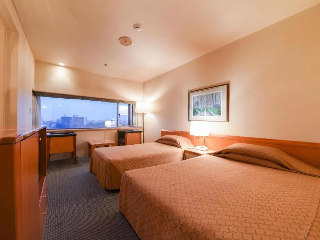 Bed in Gunma Royal Hotel