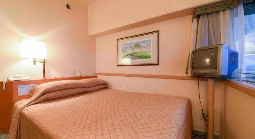 Bed in Gunma Royal Hotel