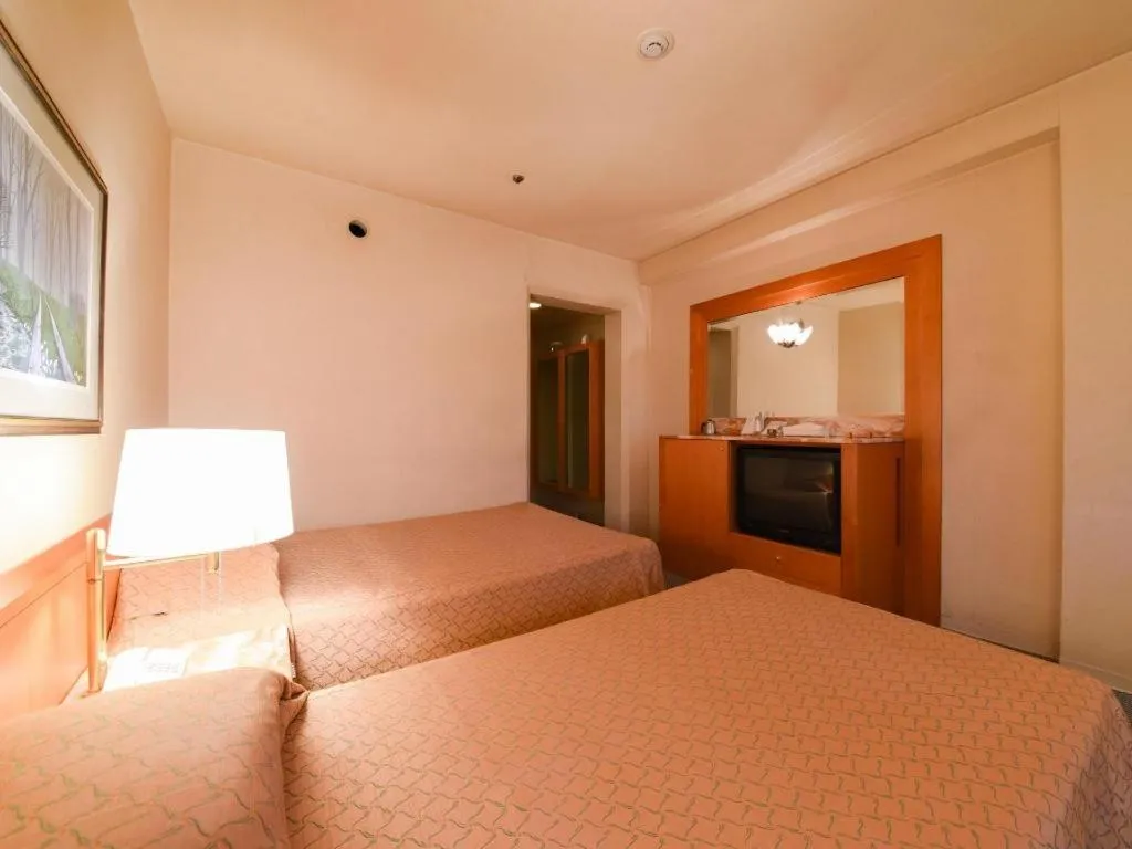 Bed in Gunma Royal Hotel