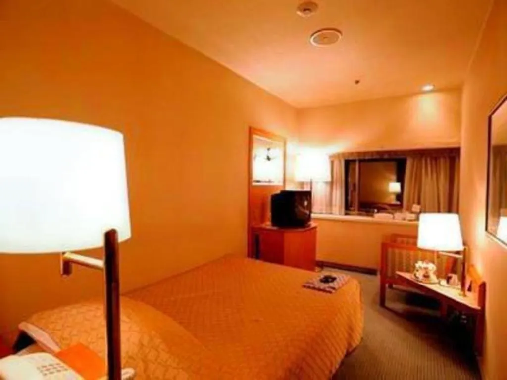 Bed in Gunma Royal Hotel