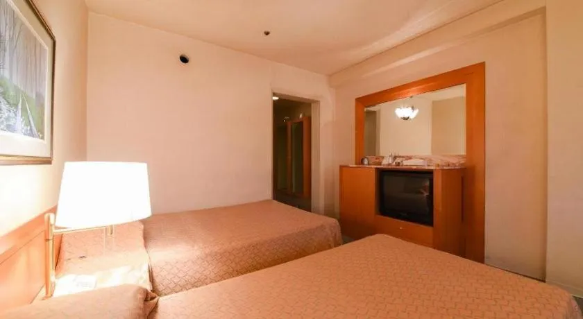 Bed in Gunma Royal Hotel