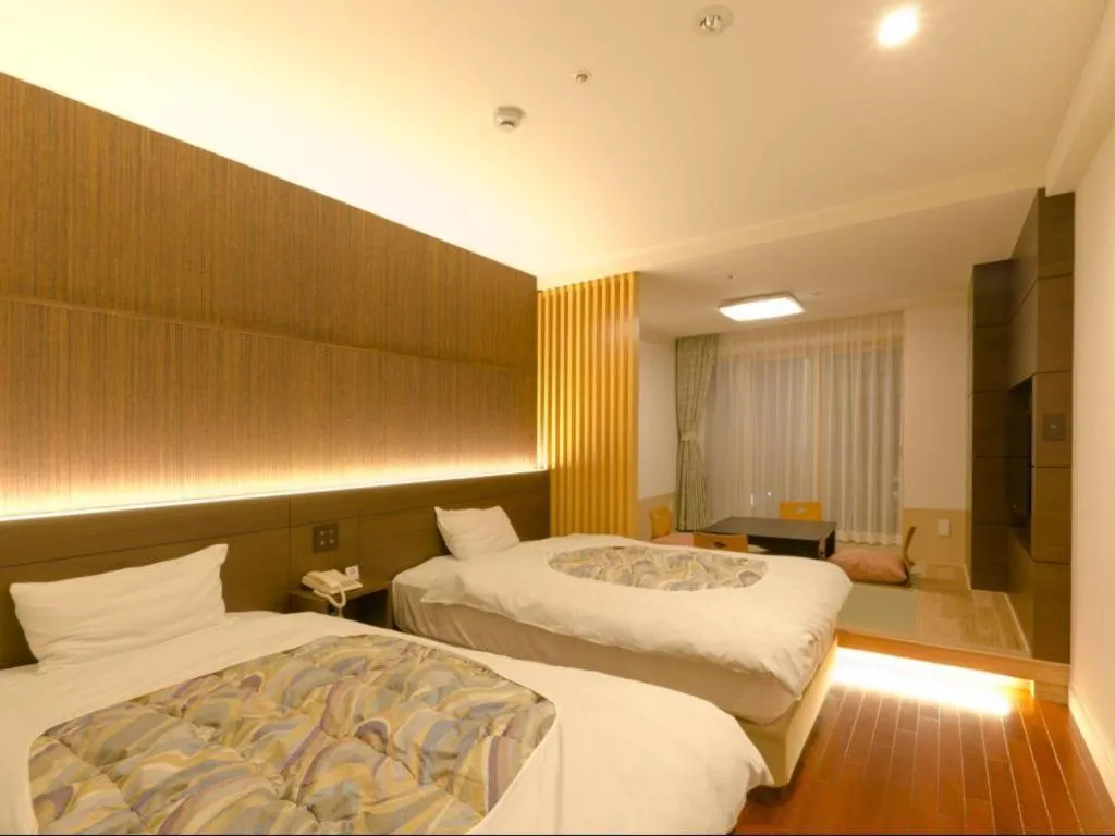 Bed in Kannawa Onsen Hotel Sansuikan