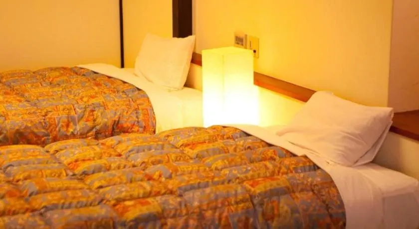 Bed in Kannawa Onsen Hotel Sansuikan