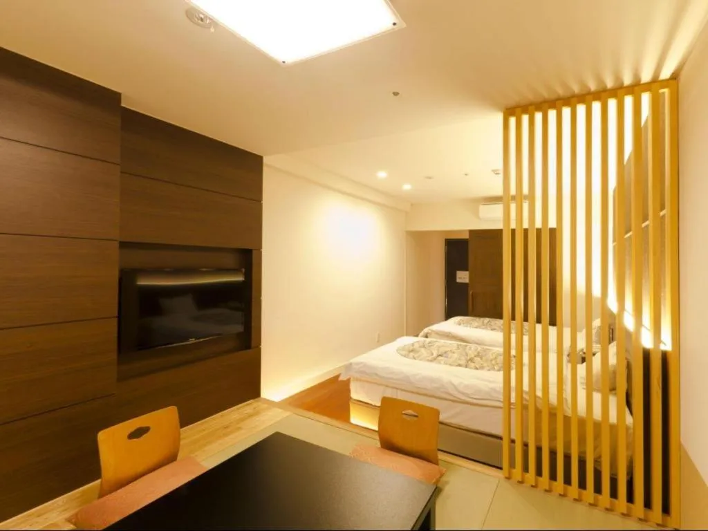 Bed in Kannawa Onsen Hotel Sansuikan