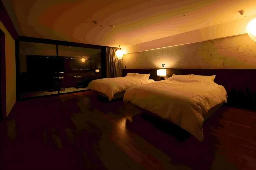 Bed in Kannawa Onsen Hotel Sansuikan