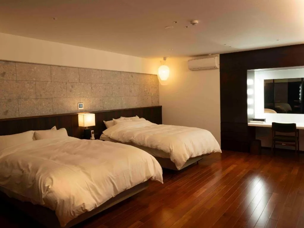 Bed in Kannawa Onsen Hotel Sansuikan