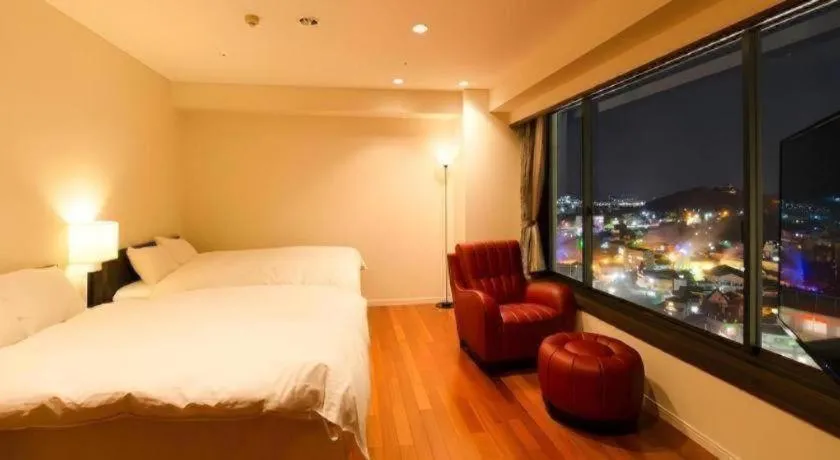 Bed in Kannawa Onsen Hotel Sansuikan