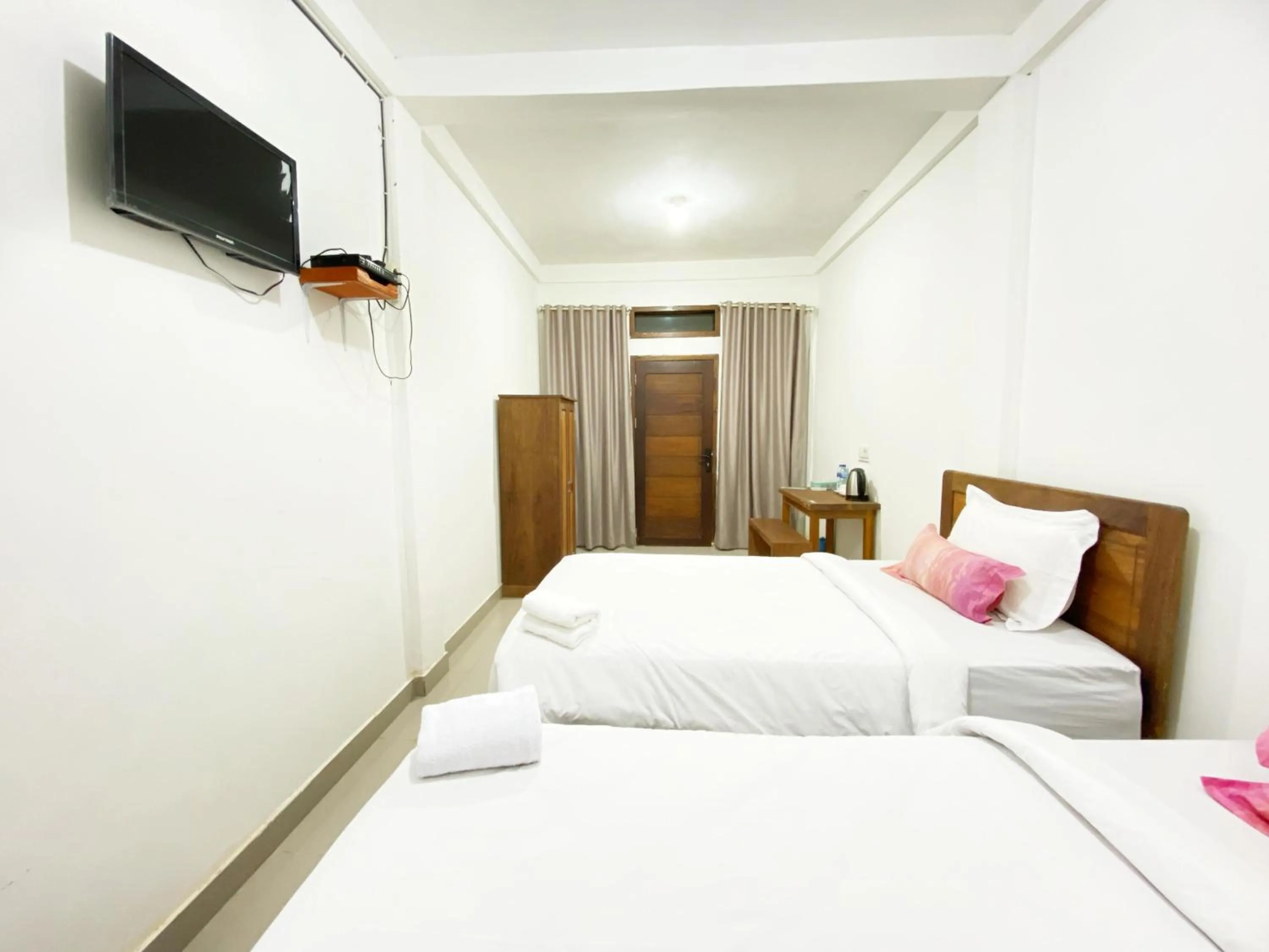 Bedroom, Bed in Bujai Mentawai Griya Hotel