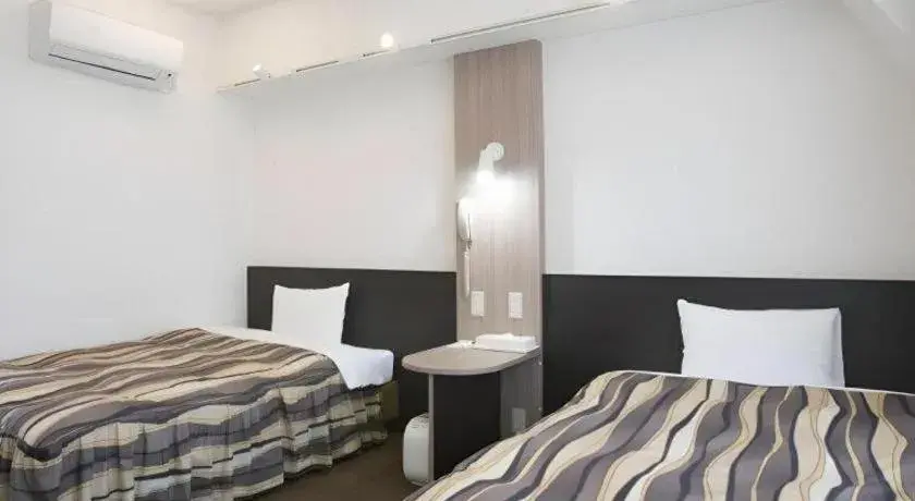 Bed in Hotel Tetora Tsurumi Bed in Hotel Tetora Tsurumi