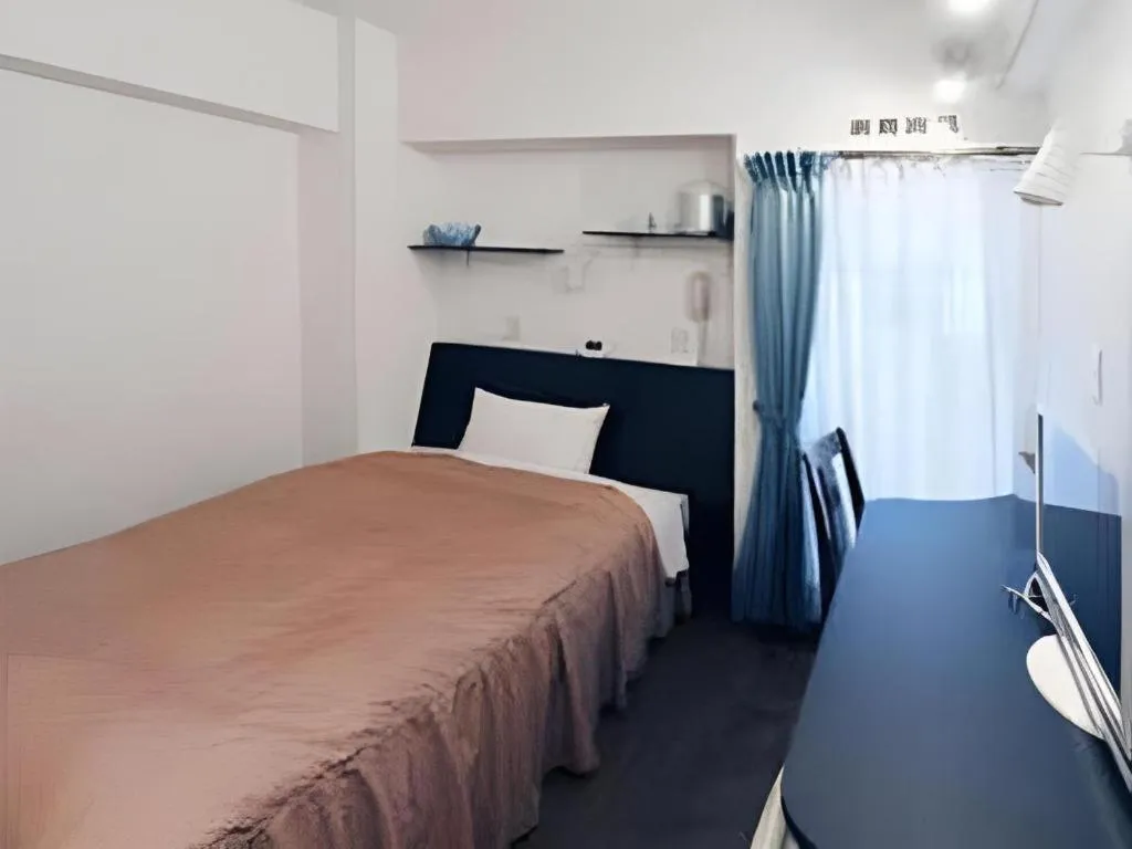 Bed in Hotel Tetora Tsurumi