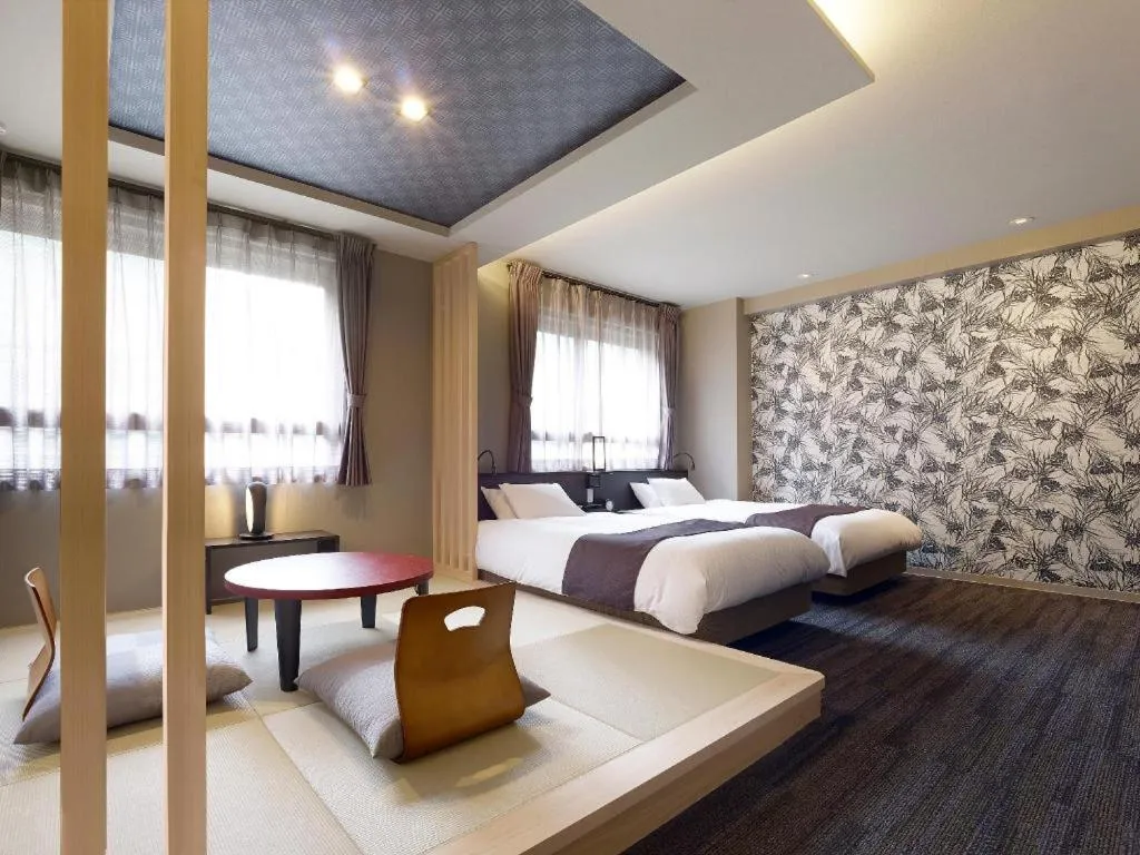 Bed in Hotel Obokekyo Mannaka