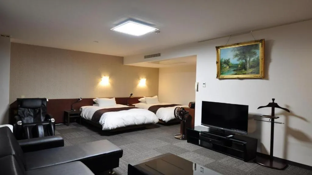 Bed in Hotel Obokekyo Mannaka