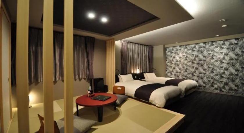 Bed in Hotel Obokekyo Mannaka