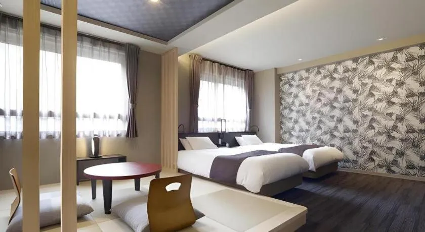 Bed in Hotel Obokekyo Mannaka