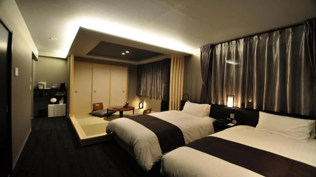 Bed in Hotel Obokekyo Mannaka