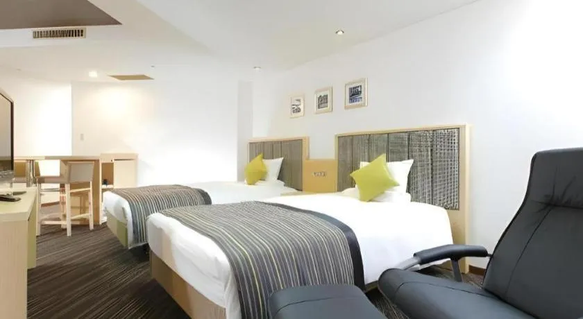 Bed in Utsunomiya Higashi Hotel