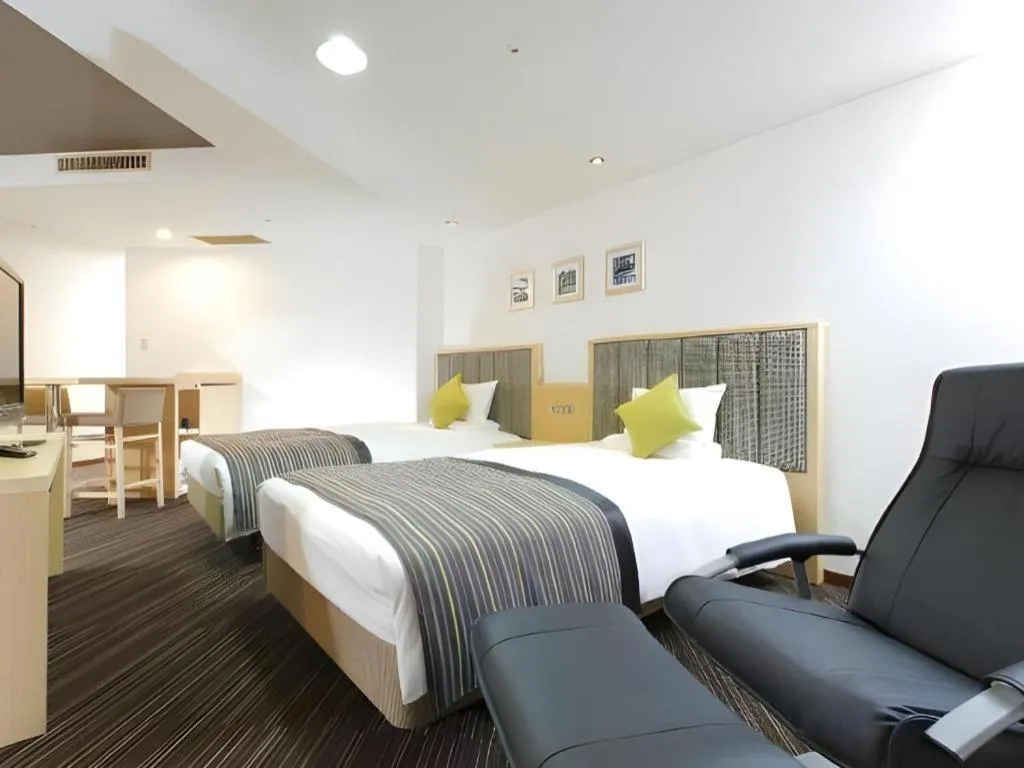 Bed in Utsunomiya Higashi Hotel