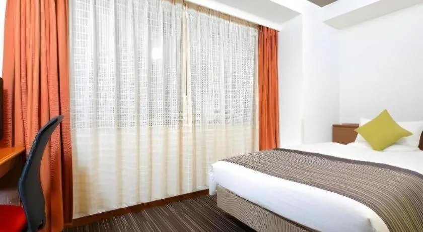 Bed in Utsunomiya Higashi Hotel