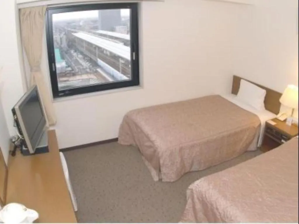 Bed in Sun Hotel Gifu Hashima