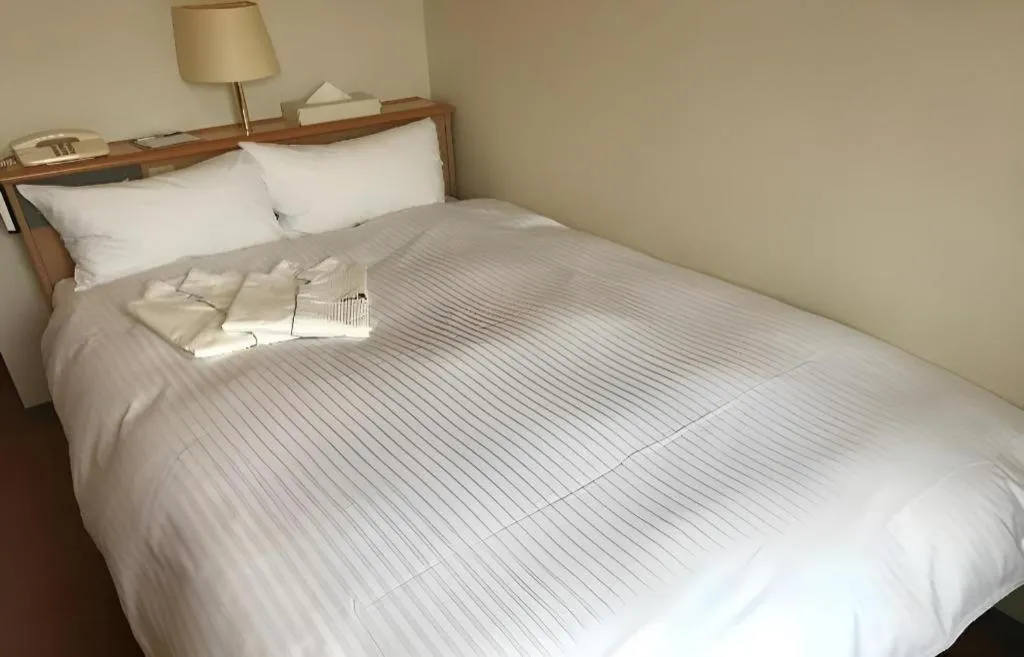 Bed in Mutsu Park Hotel