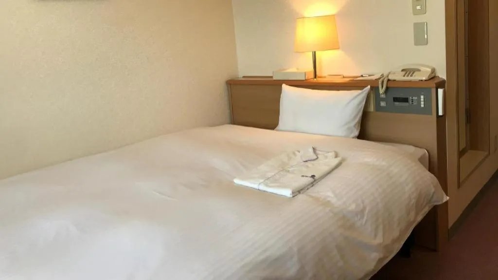 Bed in Mutsu Park Hotel