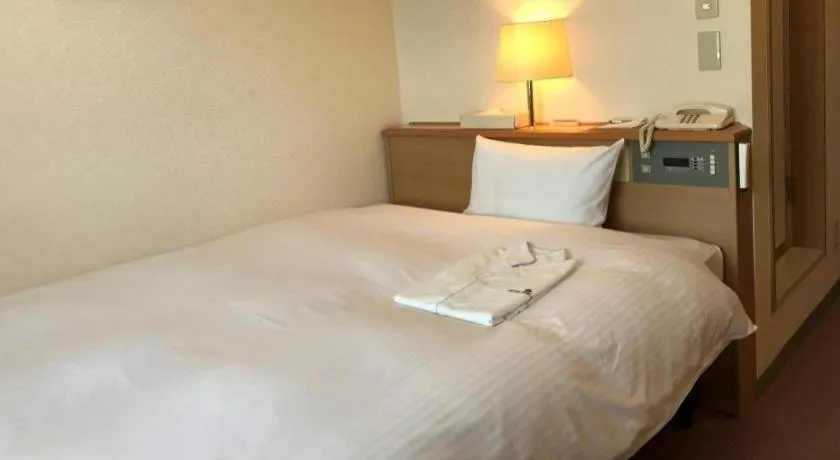 Bed in Mutsu Park Hotel