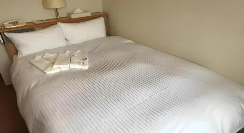 Bed in Mutsu Park Hotel