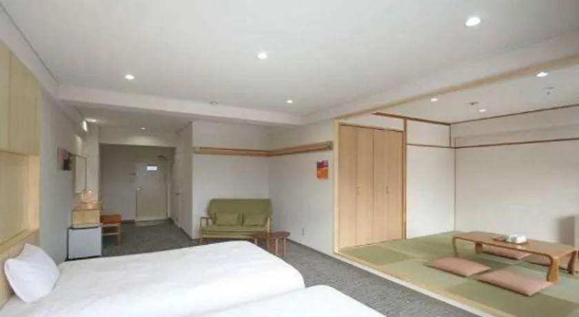 Bed in Muika Onsen Hotel