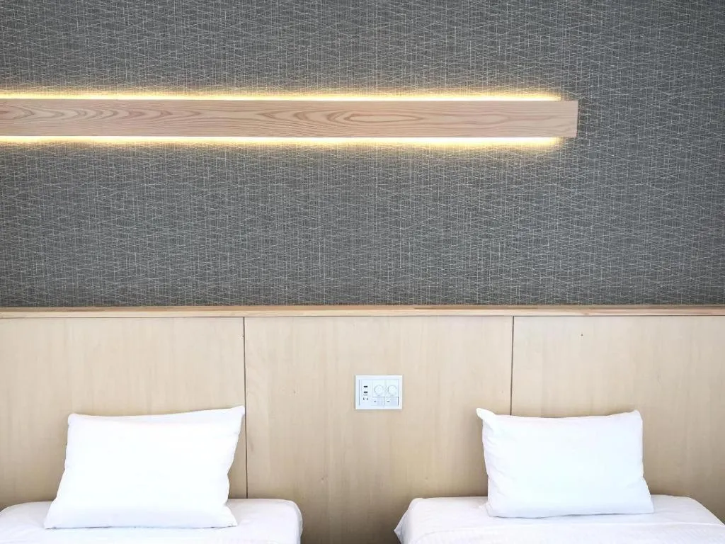 Bed in Muika Onsen Hotel