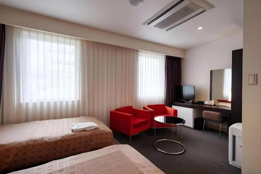 Bed in Hotel Yuquesta Asahibashi