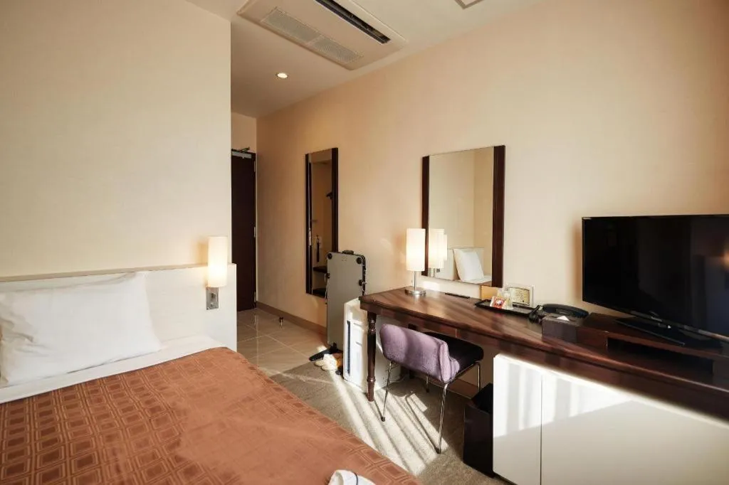 Bed in Hotel Yuquesta Asahibashi