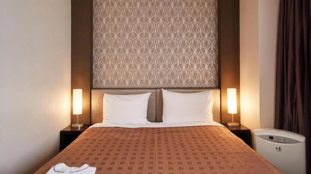 Bed in Hotel Yuquesta Asahibashi